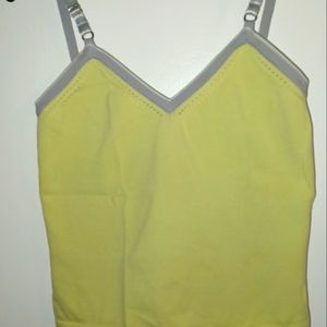 Crop lime green top, yellow size Small easel top 100% Nylon . Made in Hong Kong